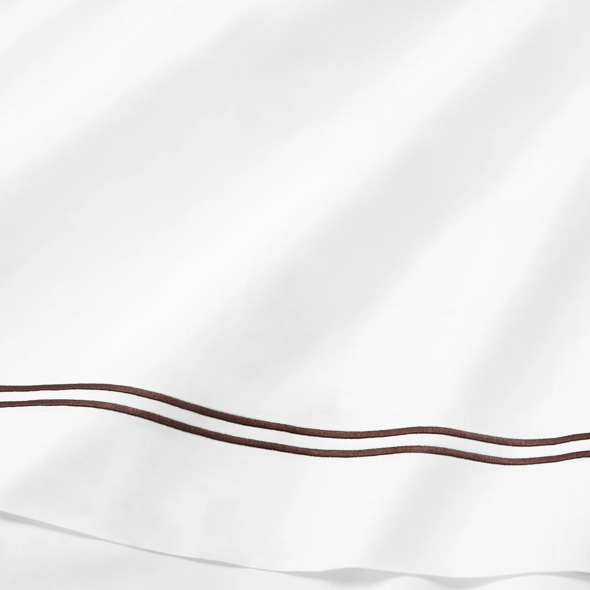 Fabric Closeup of Sferra Grande Hotel Bedding in White and Mocha