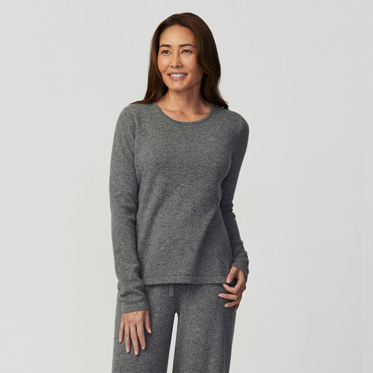 Model Wearing a Grey Sferra Intimita Long Sleeve Top