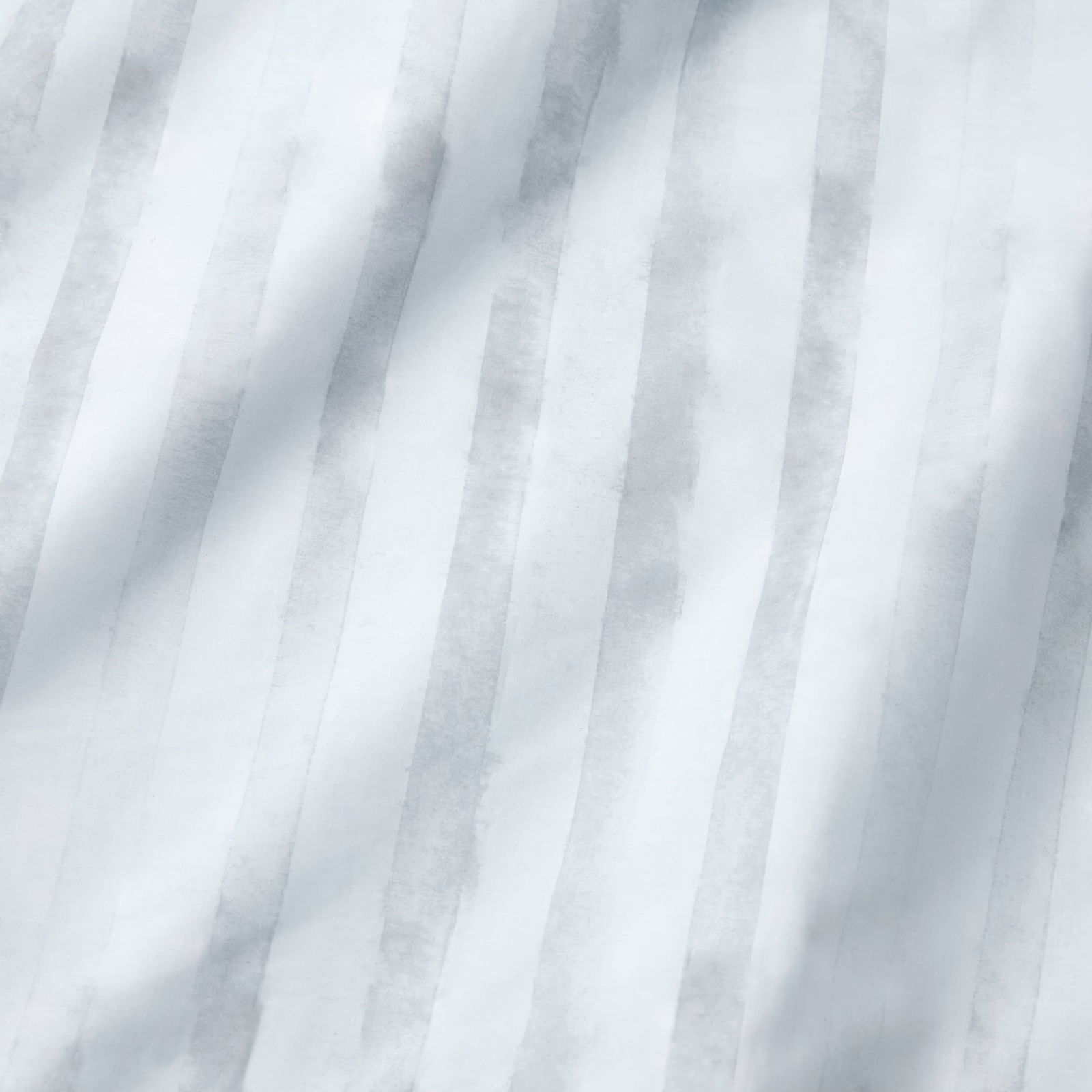 Bed in Sferra Kricia Duvet Cover and Shams in Lunar