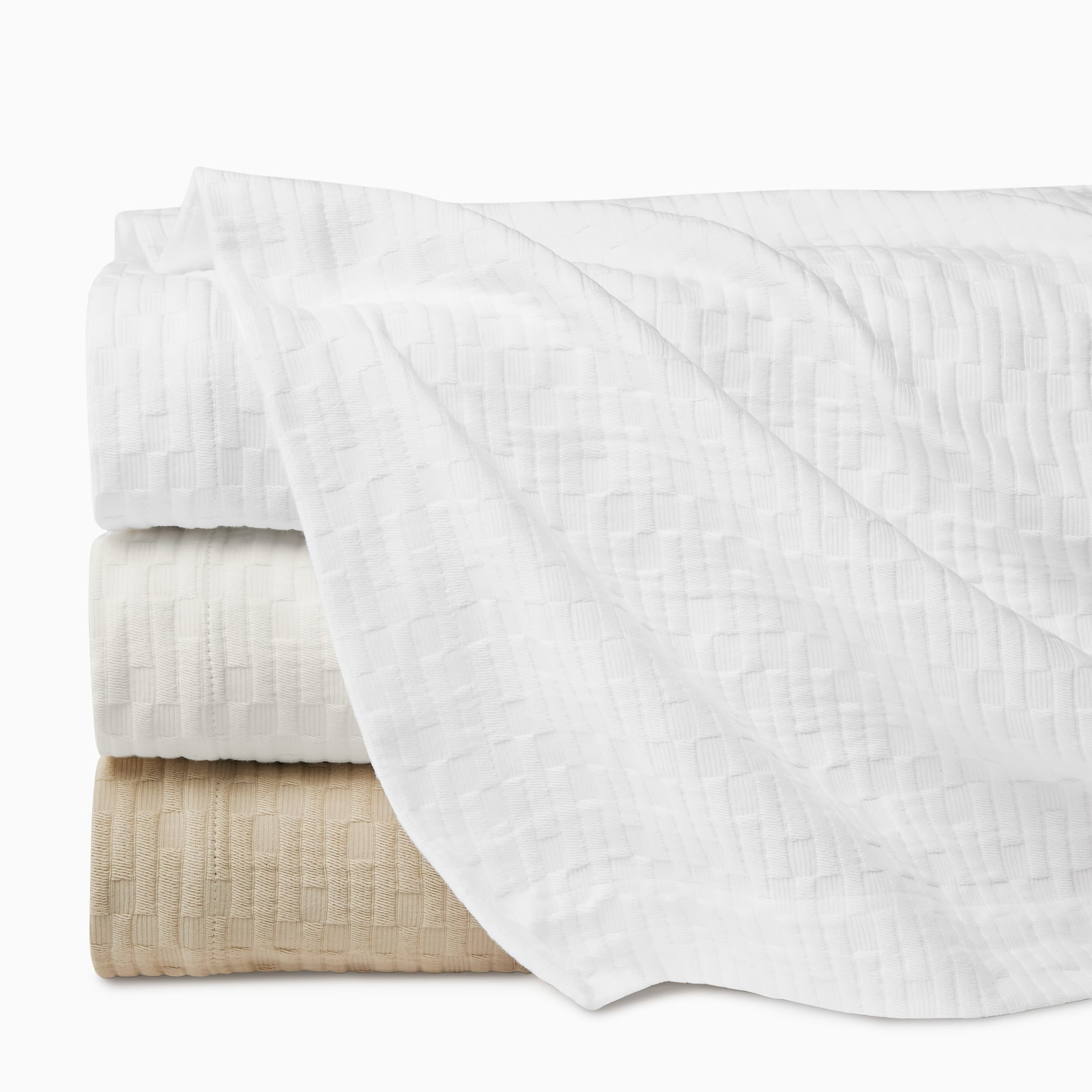 Stack of Sferra Lecce Coverlets in all colors