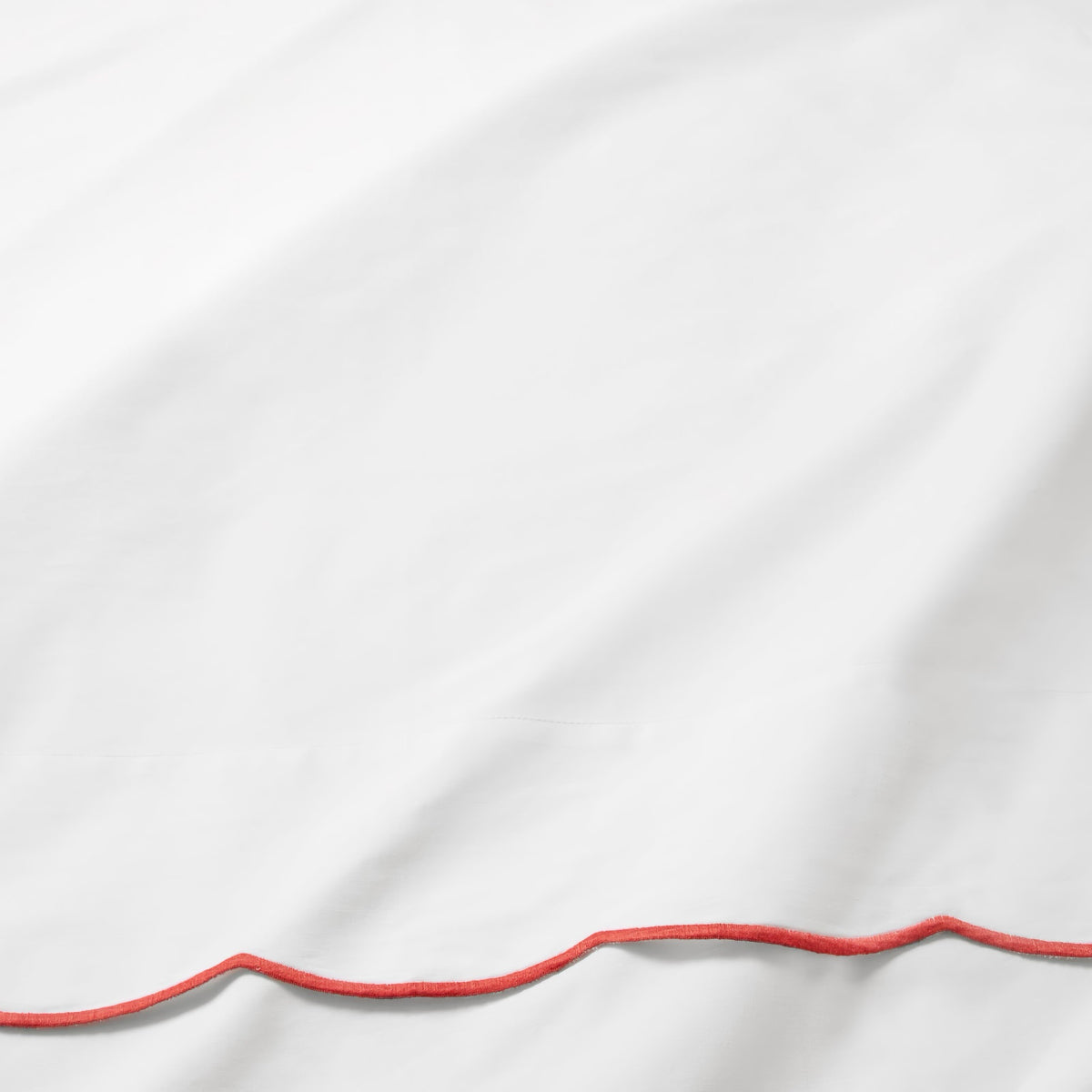 Swatch of Sferra Limana Bedding in White/Persimmon Color