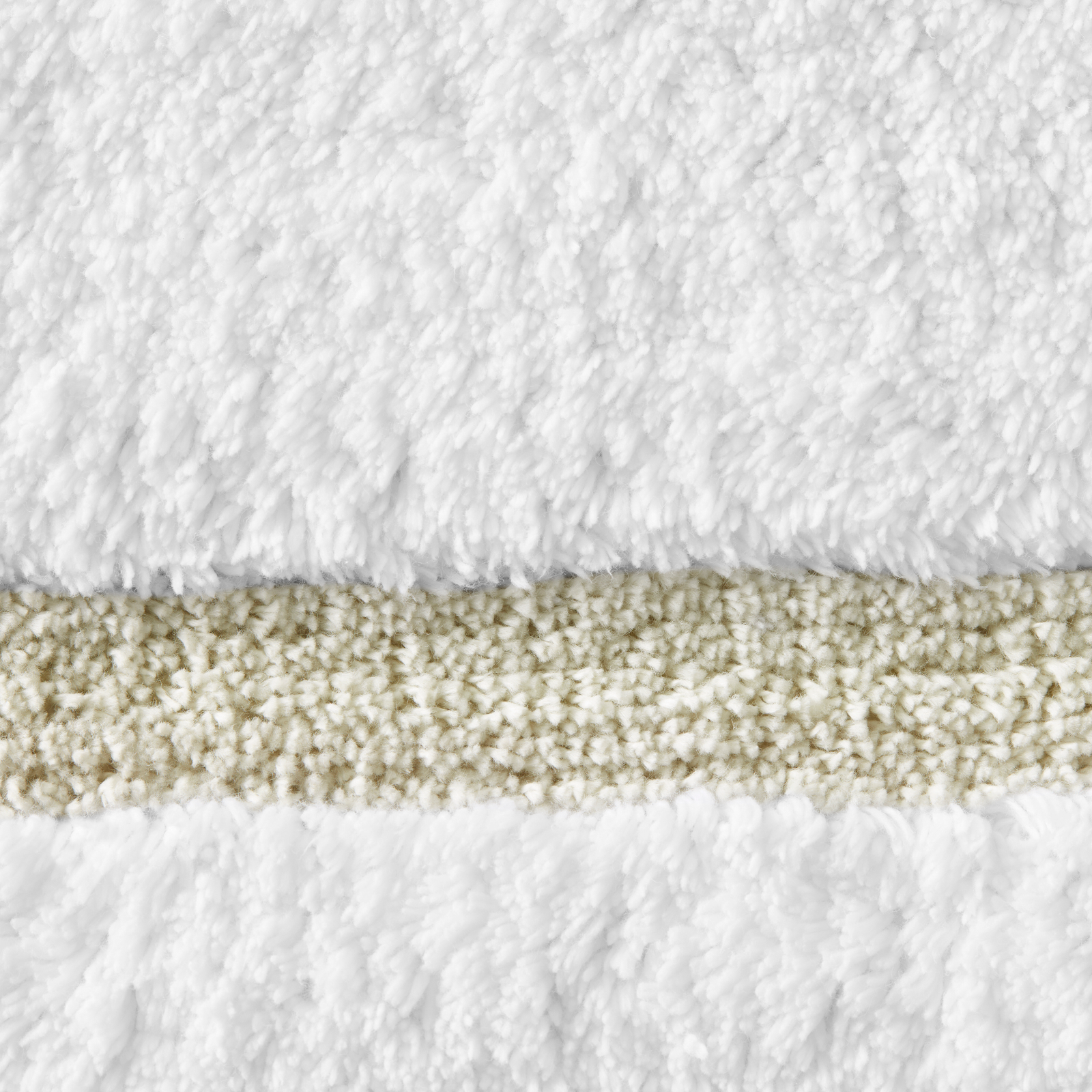 Topview of Sferra Lindo Bath Rugs in White Bisque Color