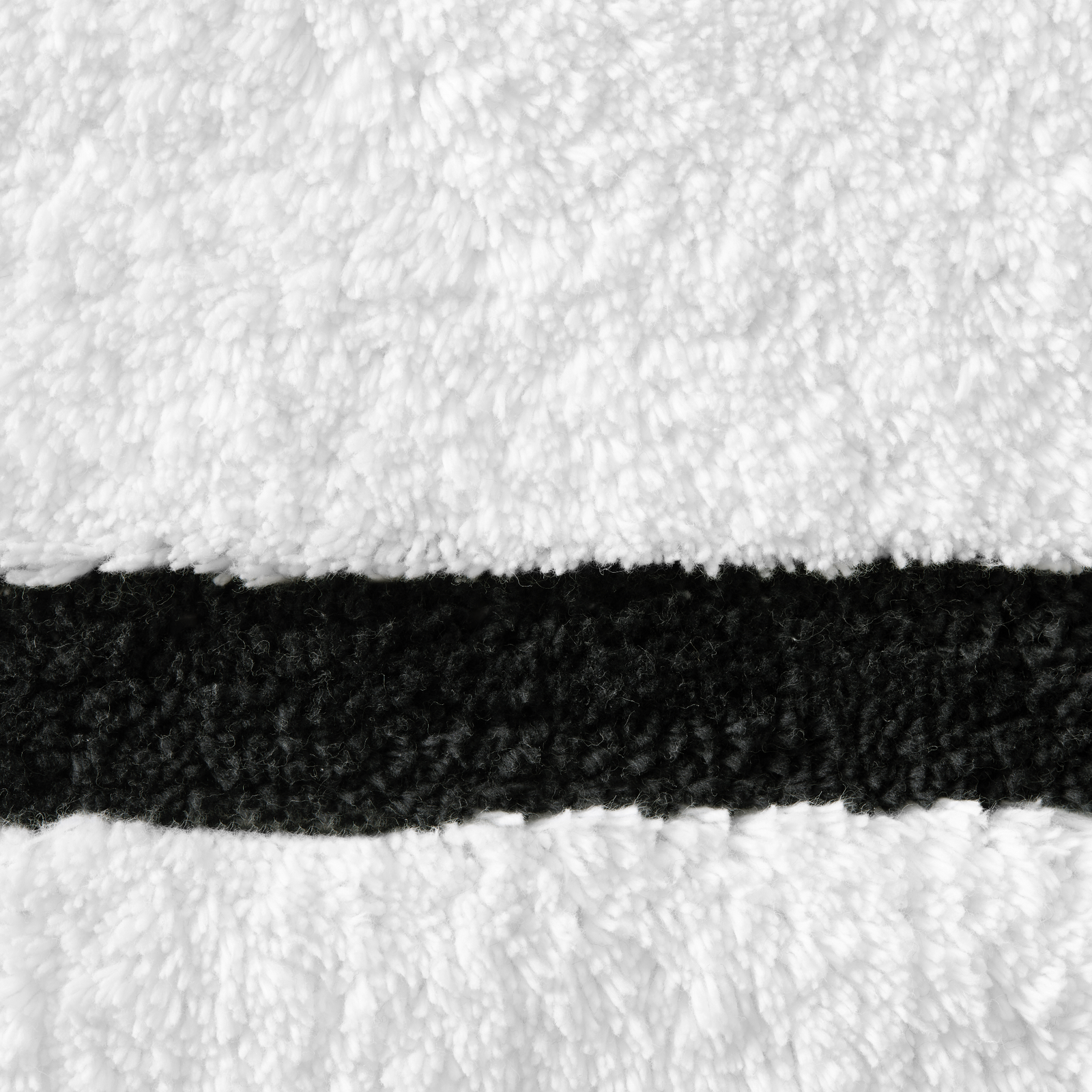 Topview of Sferra Lindo Bath Rugs in White Black Color