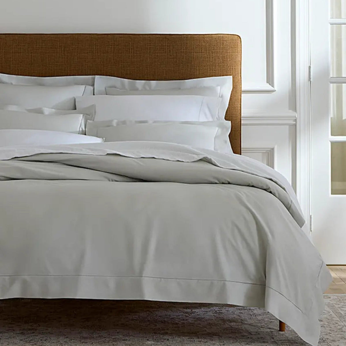 Bed Closeup with Silver Sferra Luxor Bedding Collection
