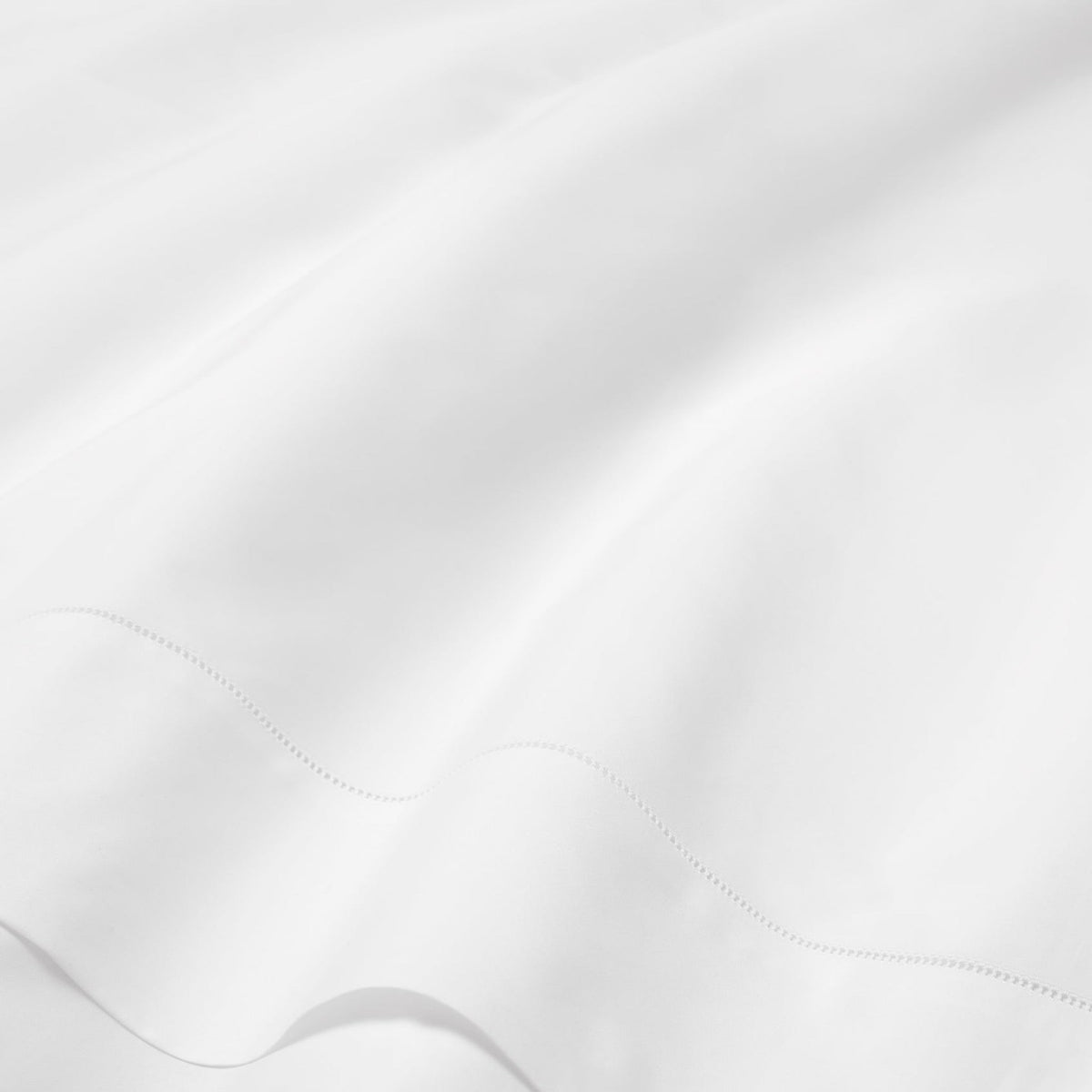 Fabric Closeup of White Sferra Luxor Bedding
