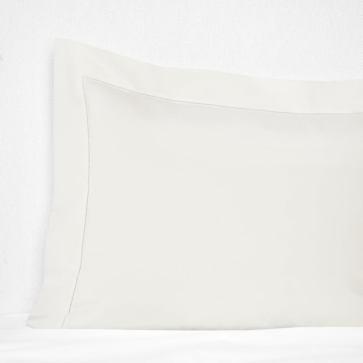 Sham Corner View of Beige Sferra Luxor Bedding