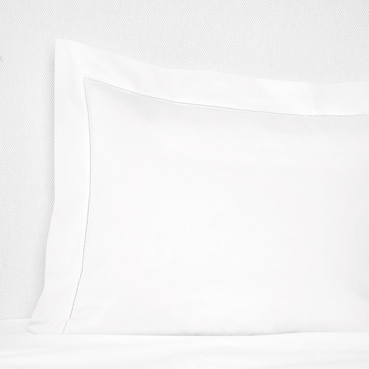 Sham Corner View of White Sferra Luxor Bedding