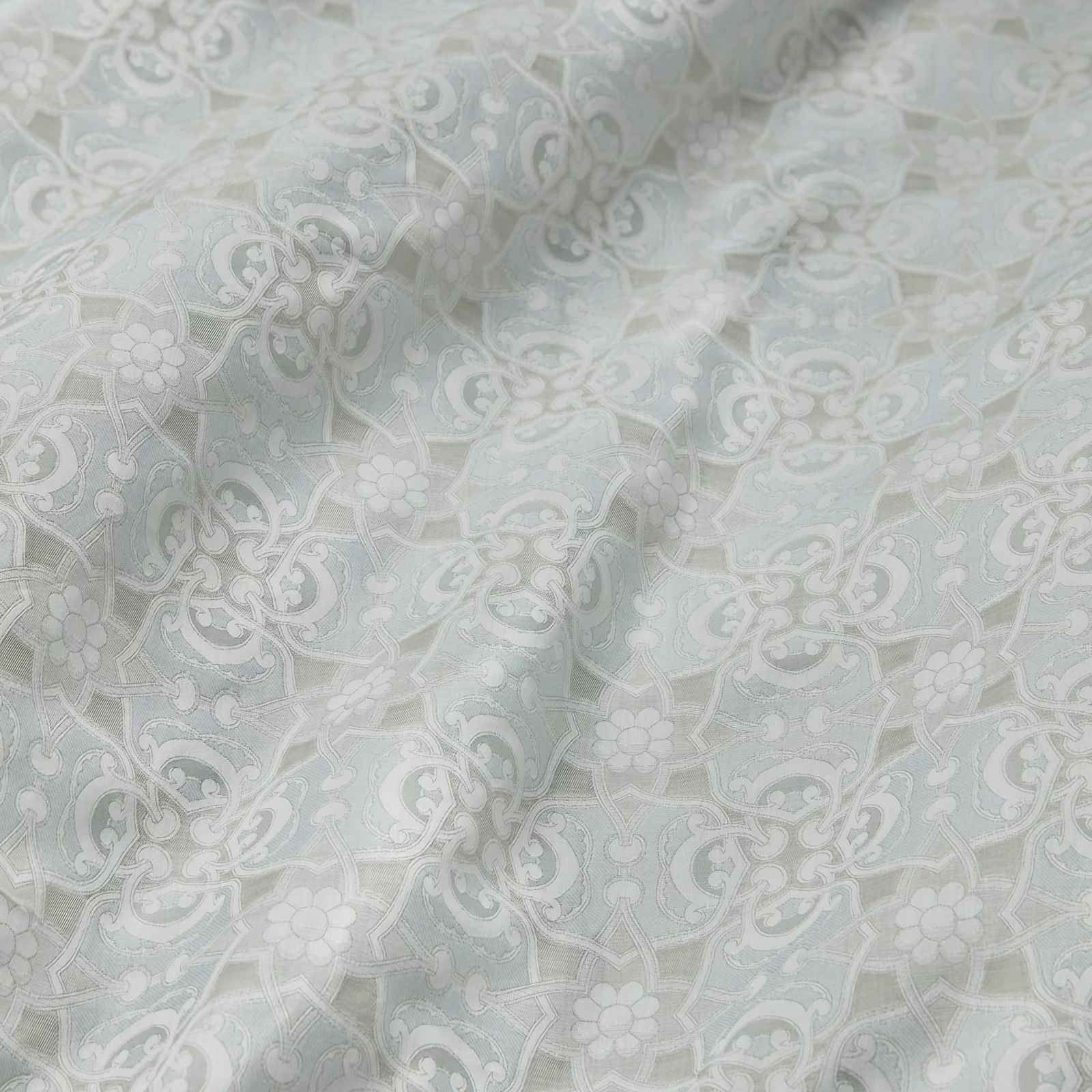 Bed in Silver Sage Sferra Maiolica Duvet Cover and Shams