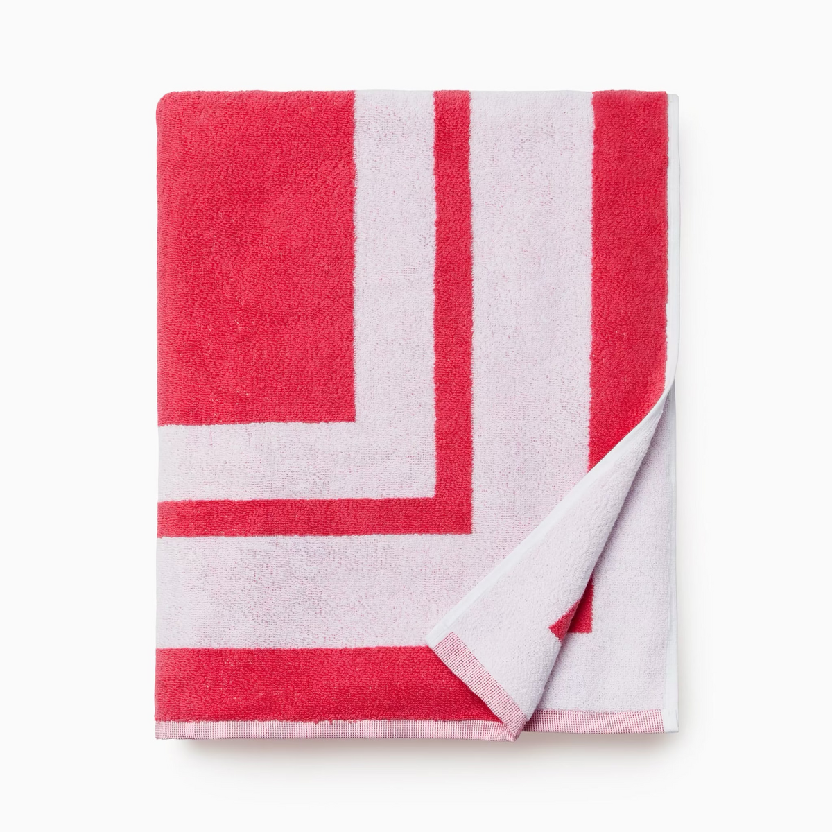 Folded Sferra Mareta Beach Towels in Coral color
