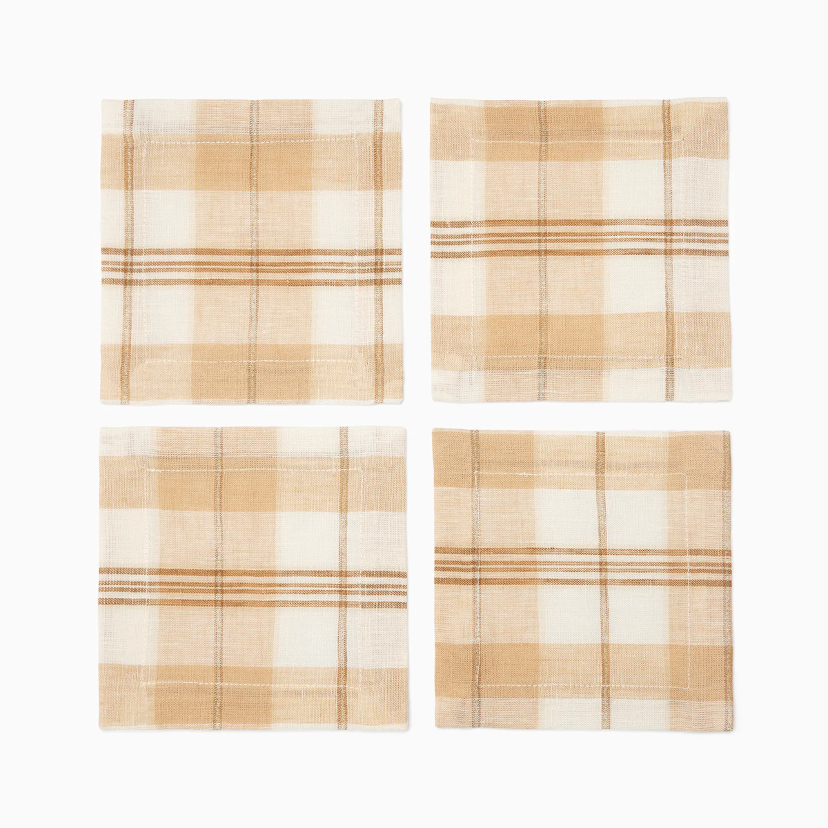 Four square Sferra Masseria Cocktail Napkins in Almond and Oyster colors, perfect for autumnal table decor or linen table linens
