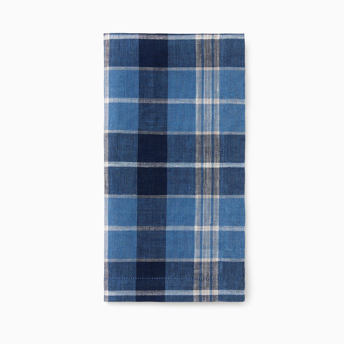 Sferra Masseria Dinner Napkin in Cadet and Navy colors—perfect for autumnal table decor—folded neatly.