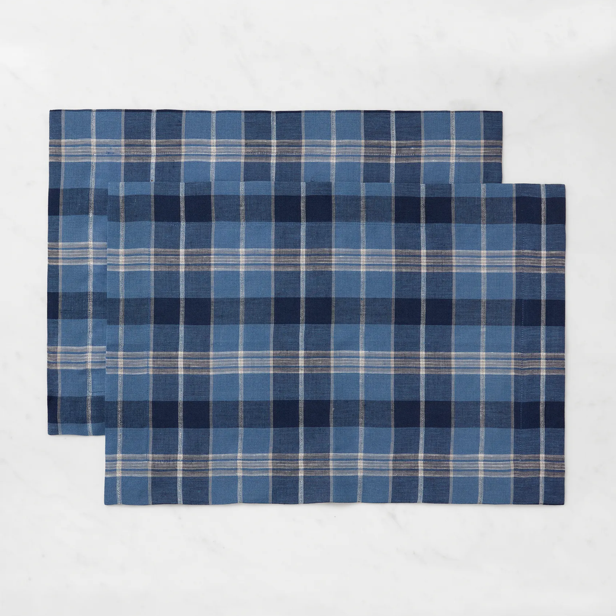 Two rectangular Sferra Masseria Placemats in Cadet and Navy colors—perfect autumnal table decor for your home