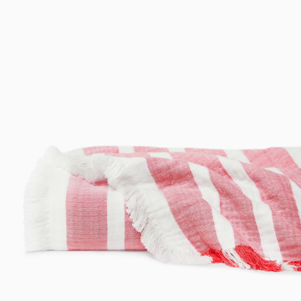 Detail View of Sferra Merlata Beach Towel in Coral color