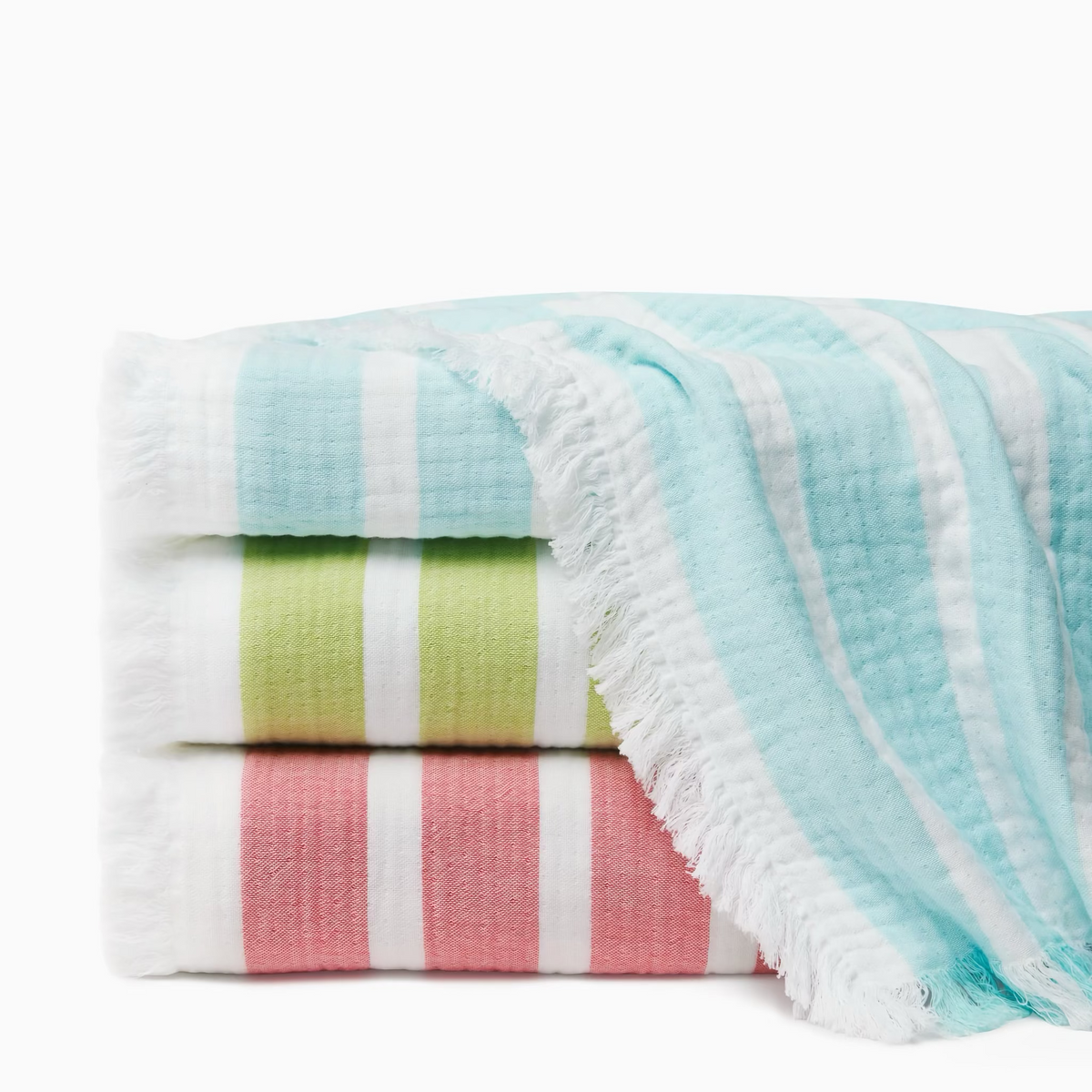 Stack of Sferra Merlata Beach Towels with Eyelash Fringe 