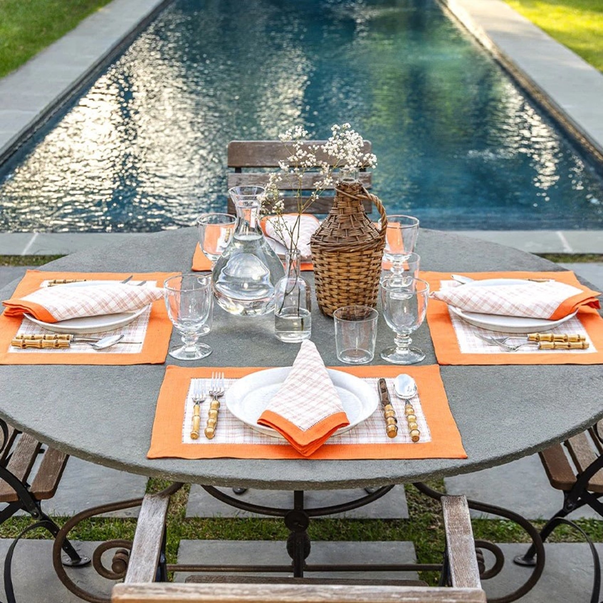 Lifestyle of Sferra Mikela Table Linens in Tangerine Color