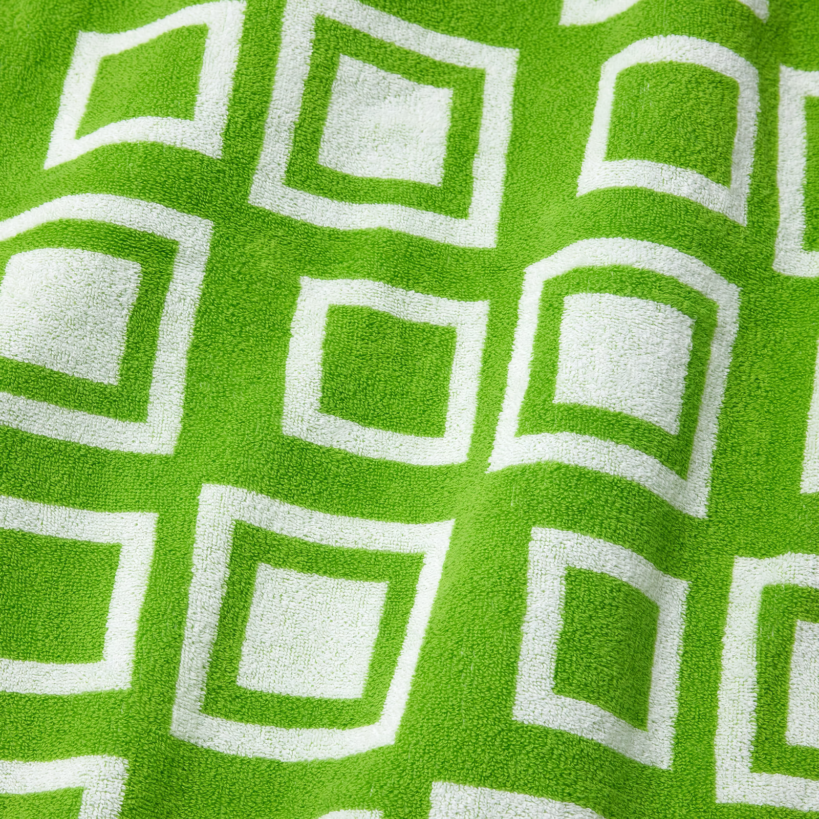 Folded Sferra Monterosso Beach Towels in Citrus