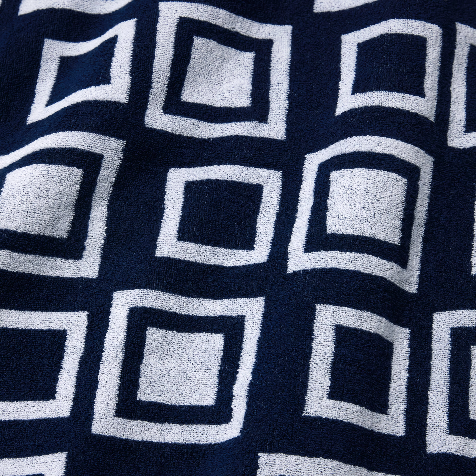 Folded Sferra Monterosso Beach Towels in Midnight