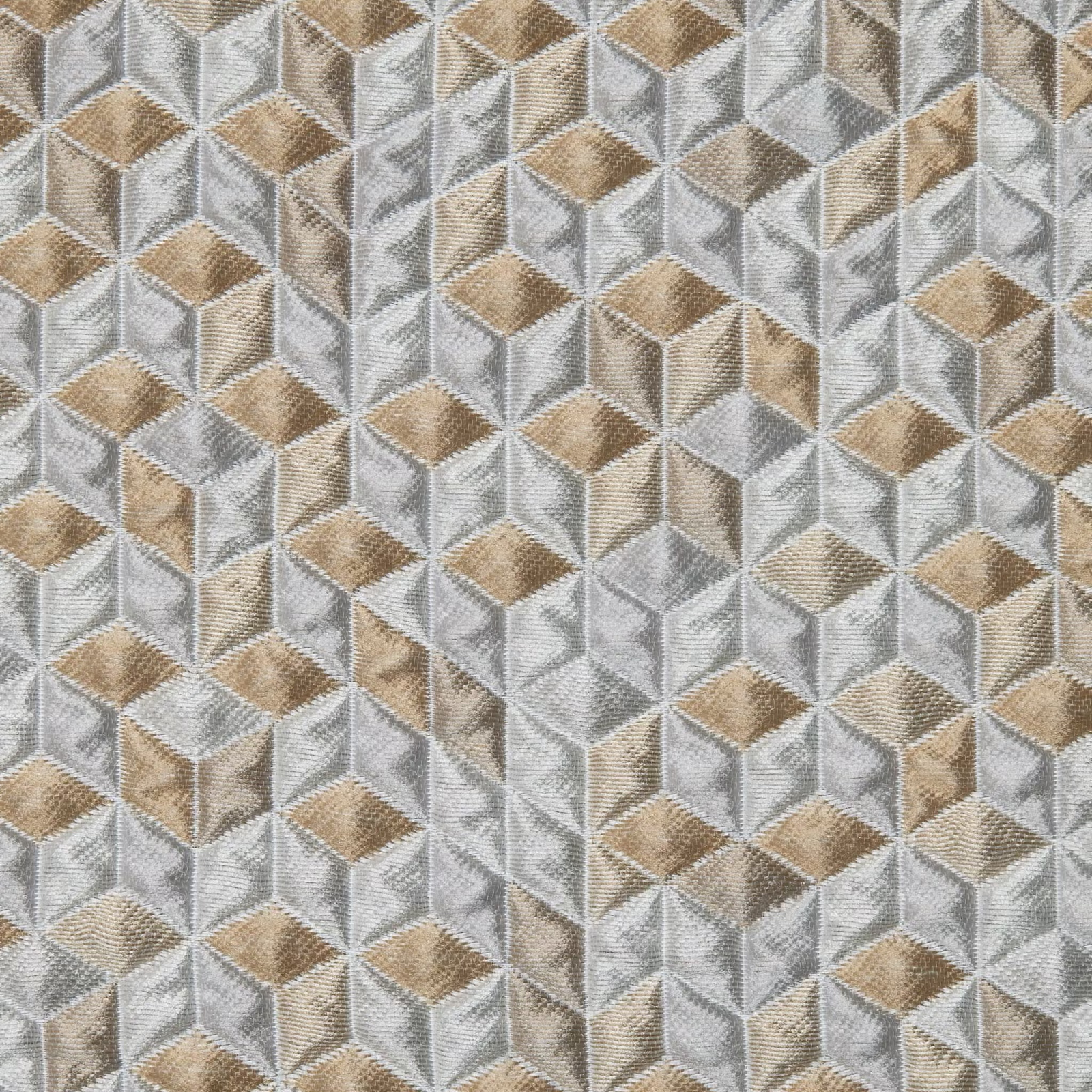 A rust-colored armchair with mineral-inspired texture and a Sferra Nesso Decorative Pillow, beside a vase of yellow flowers.