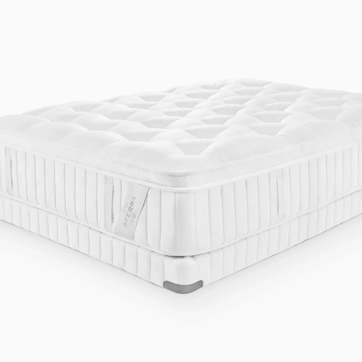 A luxury Sferra Nuvole CV Pillowtop Mattress with a thick, cushioned top and vertical stitched sides, shown from a corner angle.