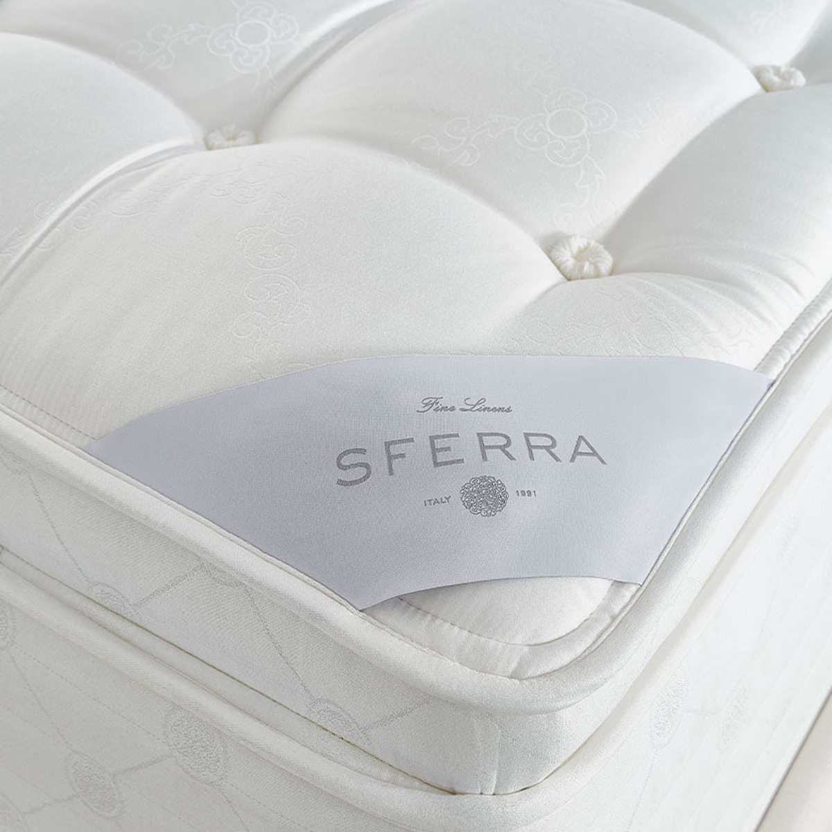 Top Corner Image of Sferra Nuvole Pillow Top Mattress Showing the Sferra Brand