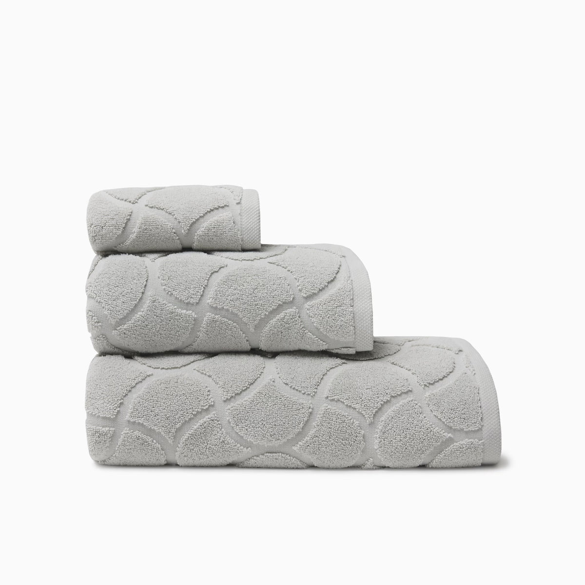 Stack of Sferra Oasi Bath Towels in Platinum color