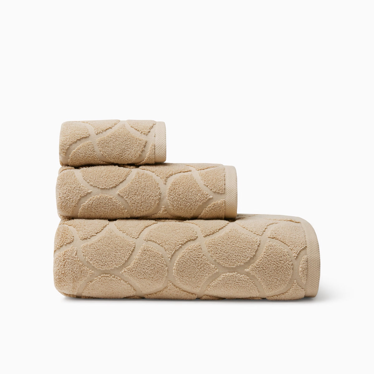 Stack of Sferra Oasi Bath Towels in Sand color