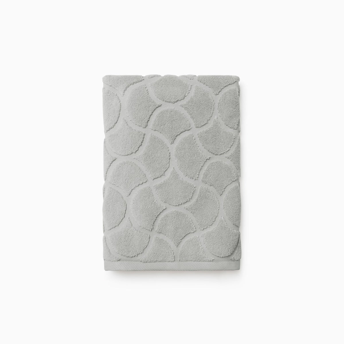 Folded Sferra Oasi Hand Towel in Platinum color
