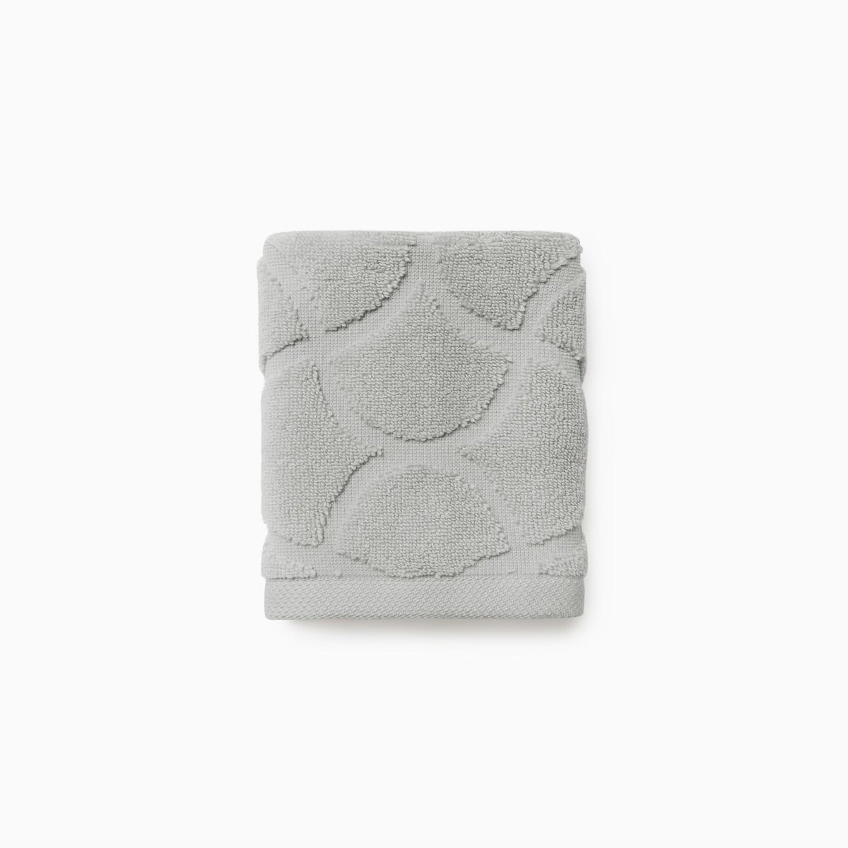 Folded Sferra Oasi Washcloth in Platinum color