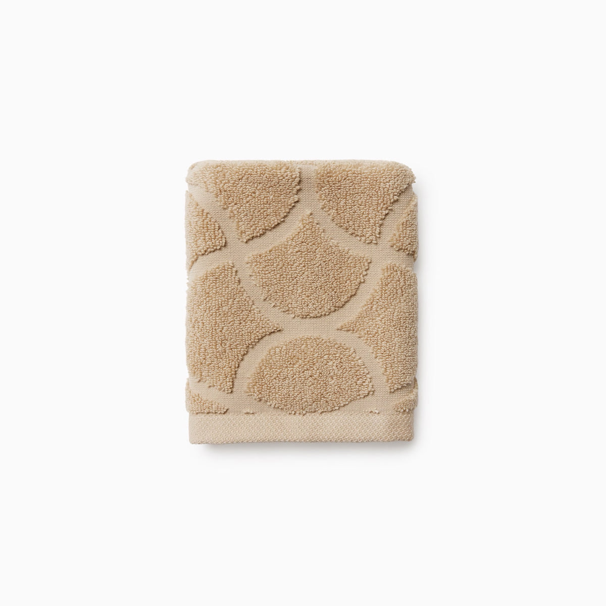 Folded Sferra Oasi Washcloth in Sand color