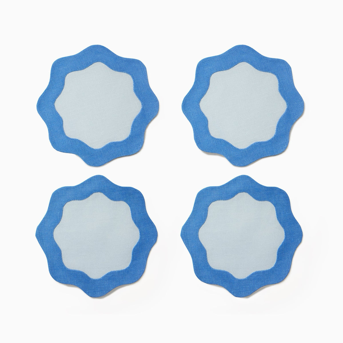 Four Sferra Cocktail Napkins in Sky and Cobalt
