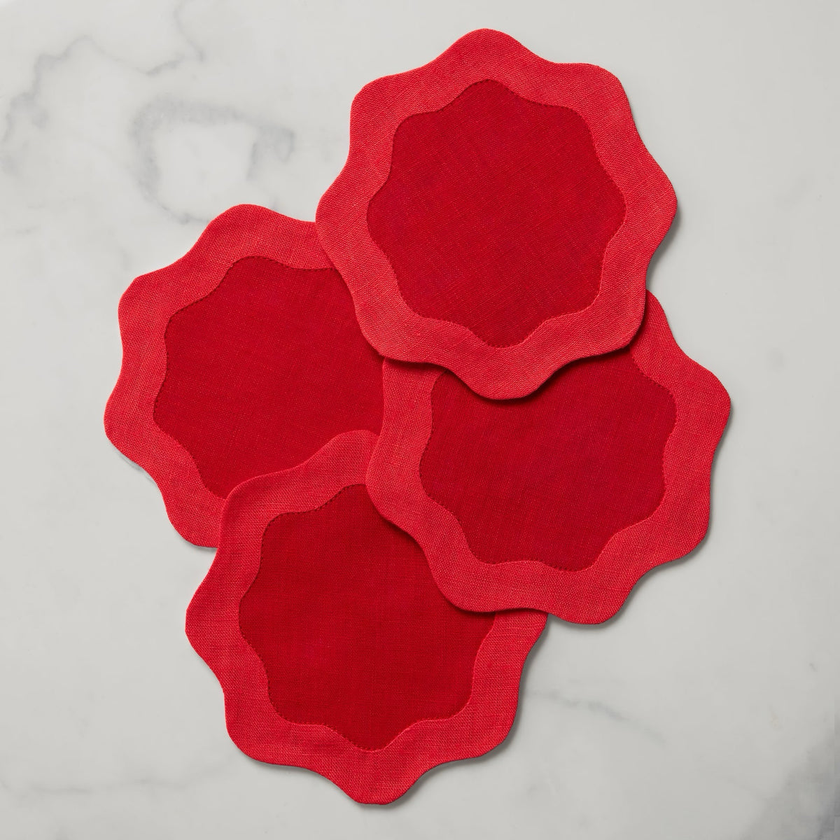 Stack of Sferra Cocktail Napkins in Red and Poppy