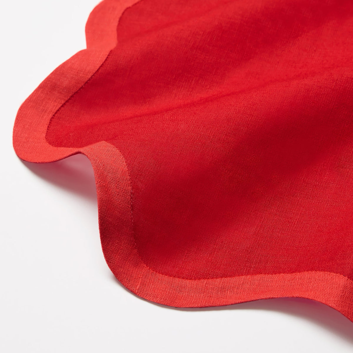 Fabric Closeup of Sferra Ondulato Table Linens in Red and Poppy