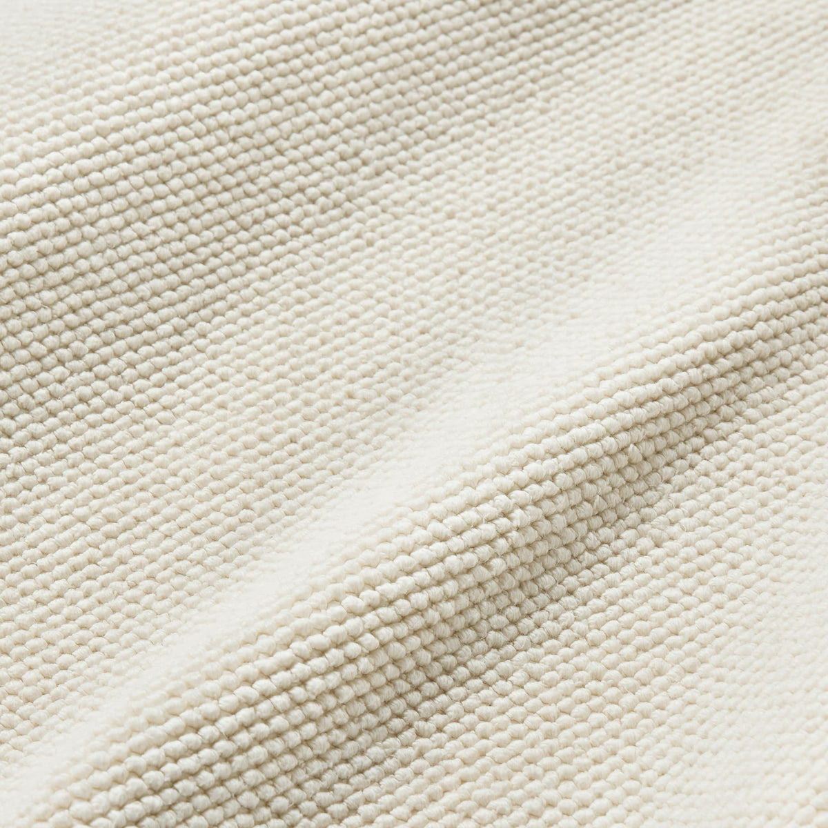 Fabric Closeup of Sferra Osini Bath Rug in Ivory
