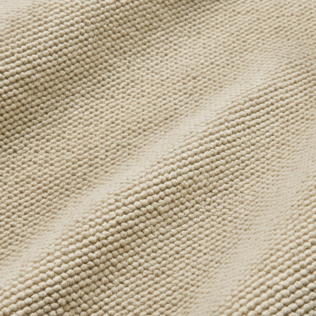 Fabric Closeup of Sferra Osini Bath Rug in Sand