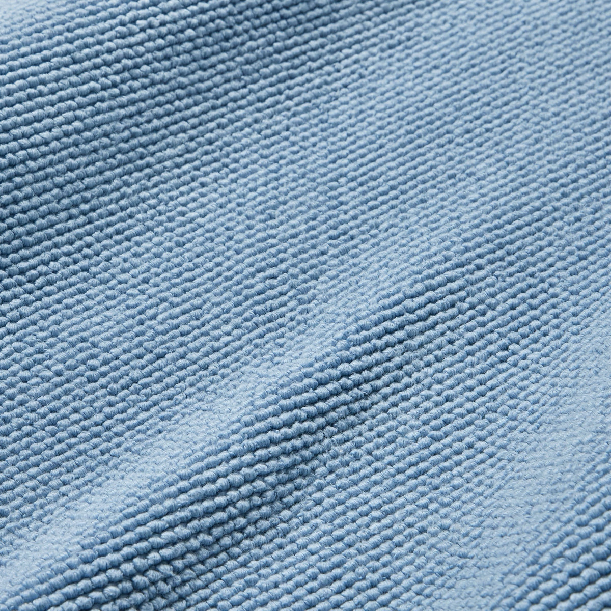 Fabric Closeup of Sferra Osini Bath Rug in Sea