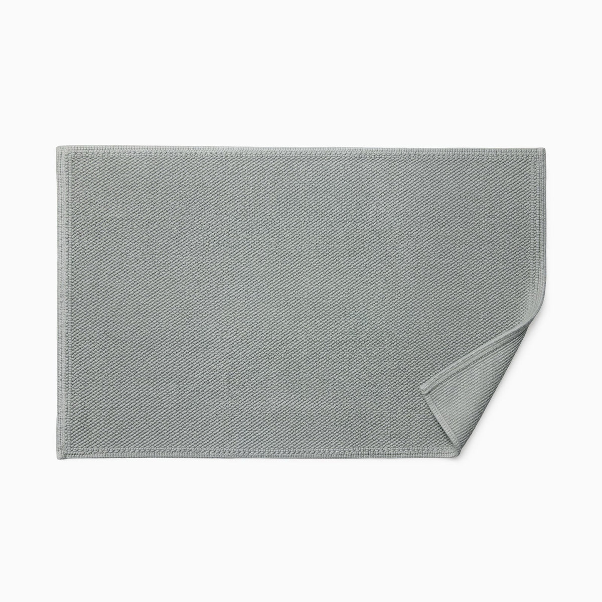 Sferra Osini Bath Rug in Platinum with fold