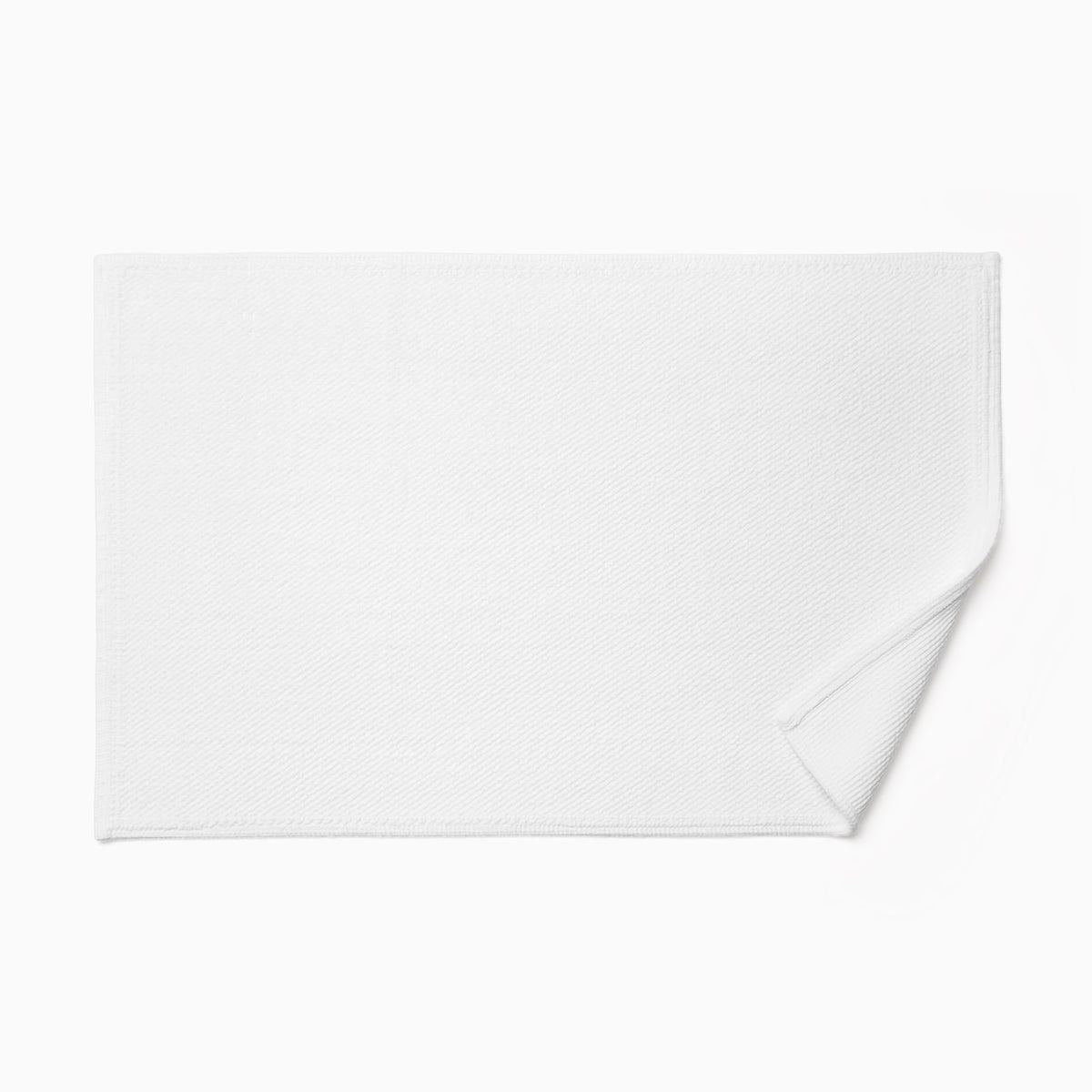 Sferra Osini Bath Rug in White with fold