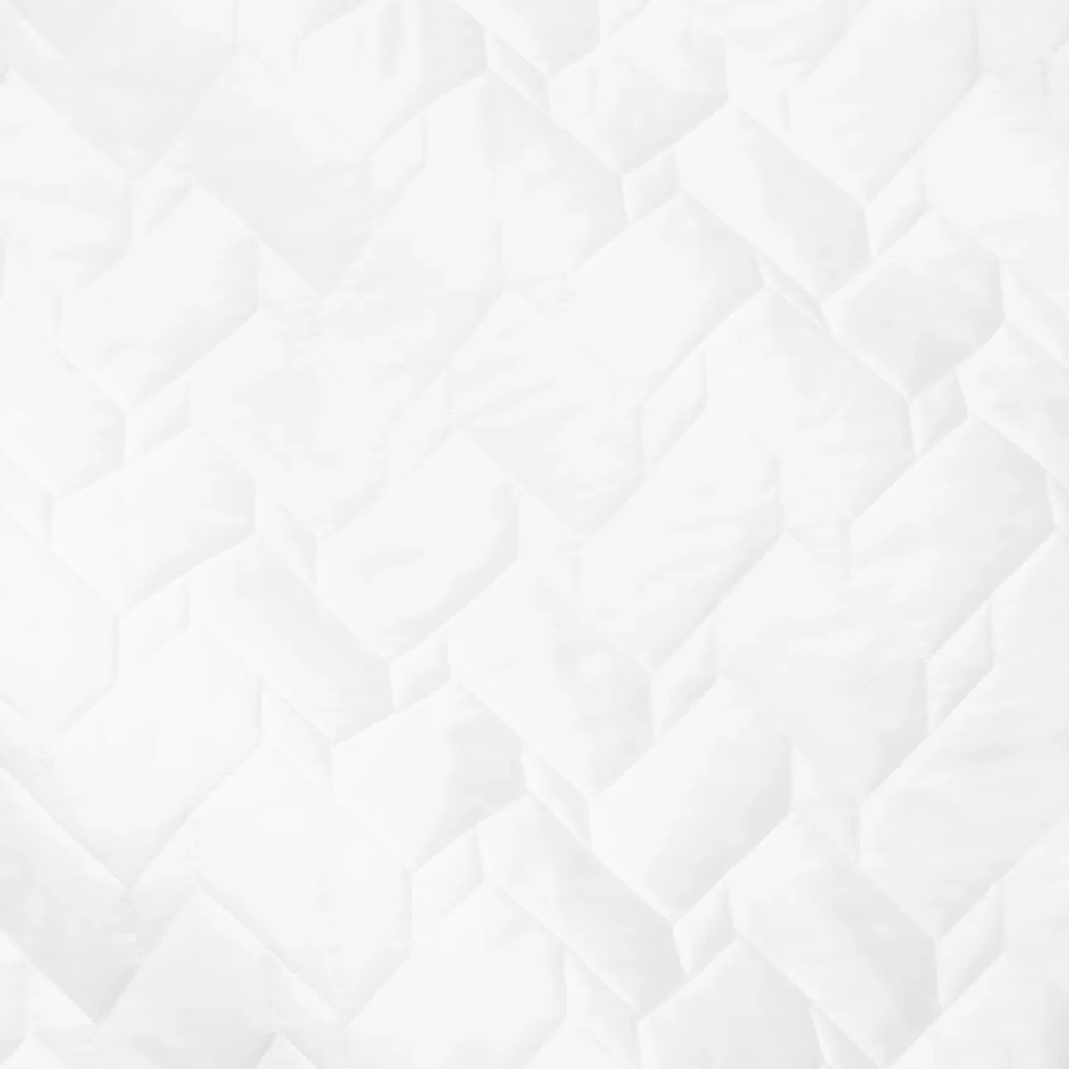 White Sferra Palatino Quilt and Shams geometric bedspread with a subtle zigzag pattern and light texture, crafted like an Italian woven quilt