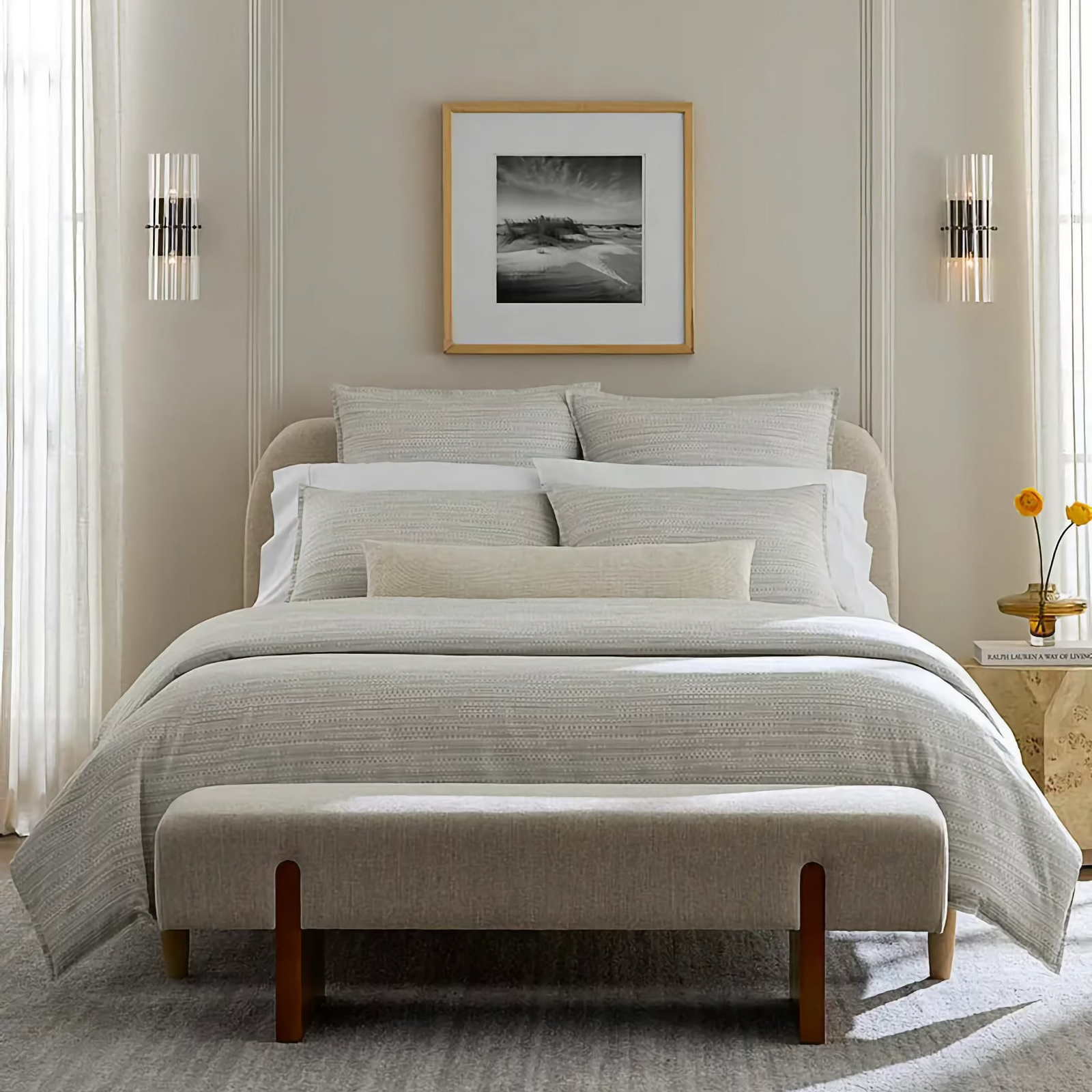 Bed in Bone color Sferra Pellestrina Duvet Cover and Shams