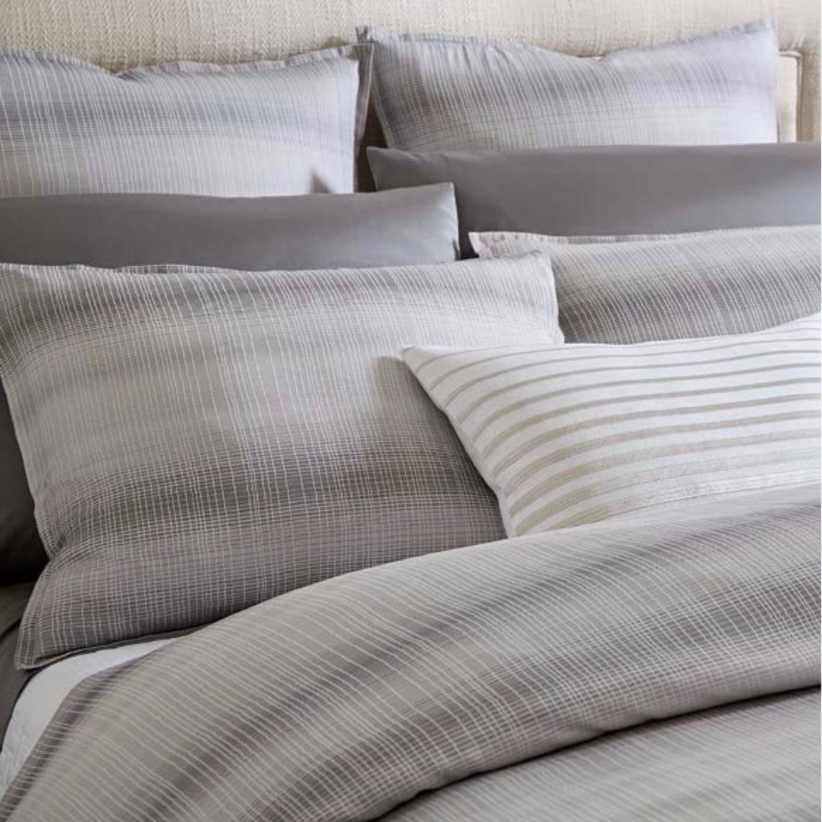 Closeup of Sferra Perugia Duvet Cover and Shams in Lunar color