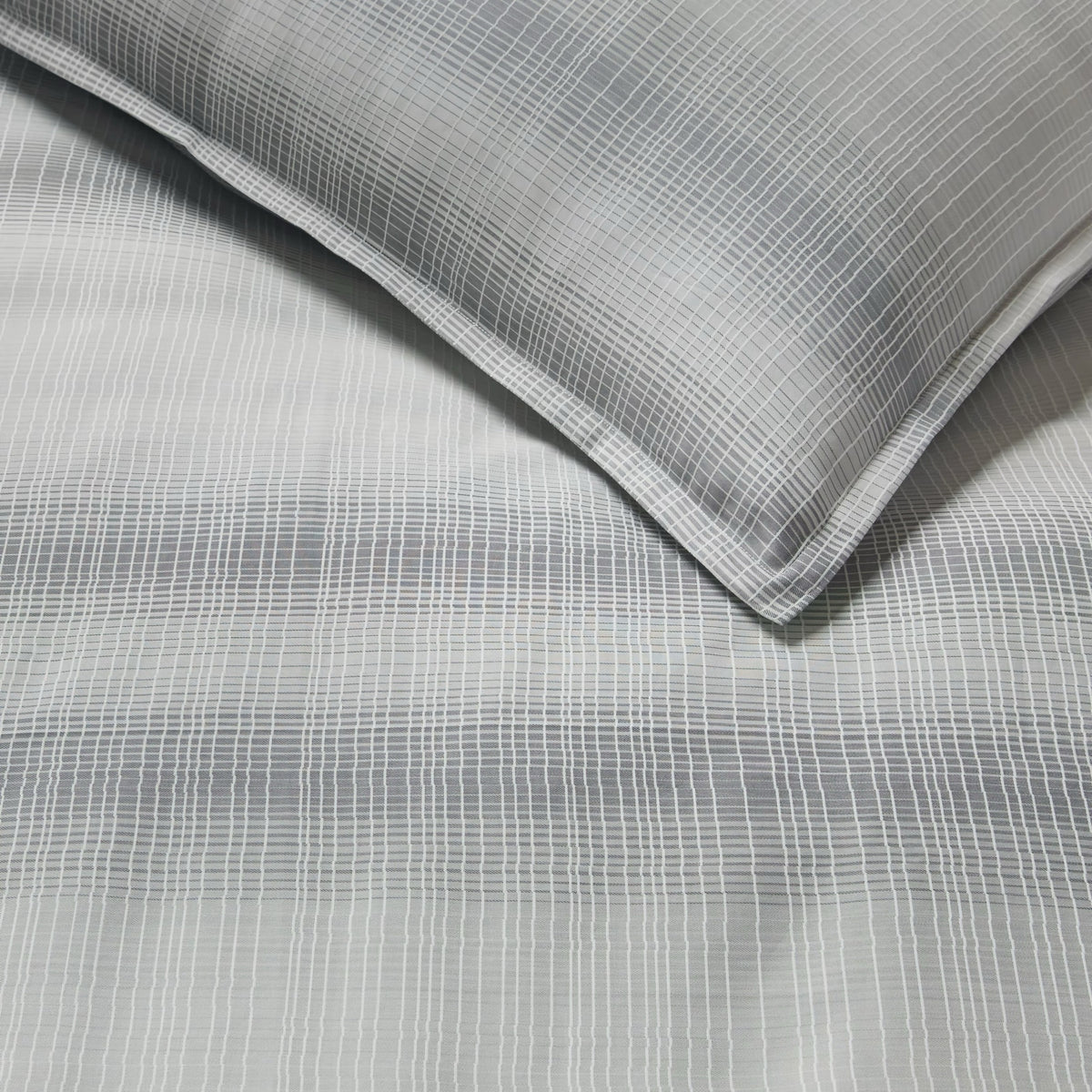 Detail view of Sferra Perugia Duvet Cover and Shams in Lunar color