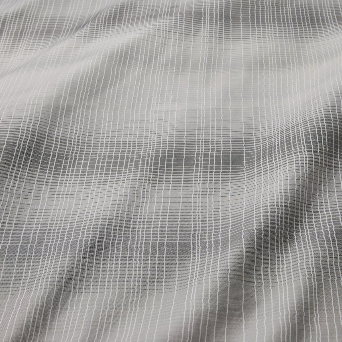 Fabric of Sferra Perugia Duvet Cover and Shams in Lunar color