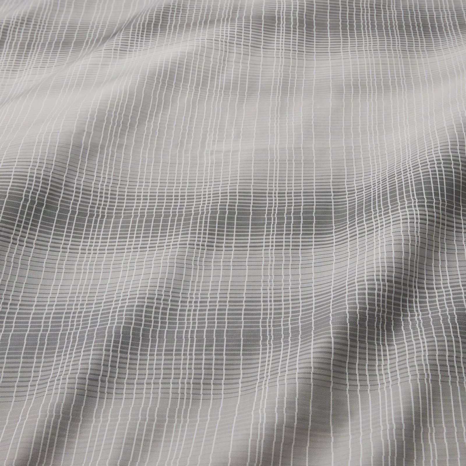 Perugia collection pairs well with Giotto titanium flat sheet, fitted sheet and pillowcases. Sampietrini white quilt and Orizzonte white/silver decorative pillow.