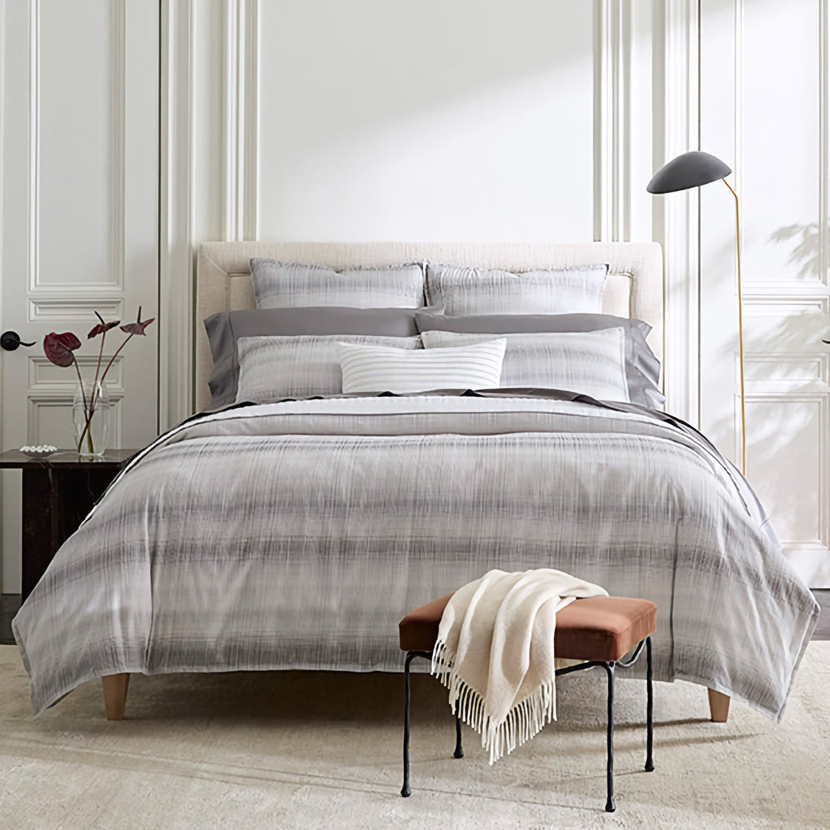 Perugia collection pairs well with Giotto titanium flat sheet, fitted sheet and pillowcases. Sampietrini white quilt and Orizzonte white/silver decorative pillow.