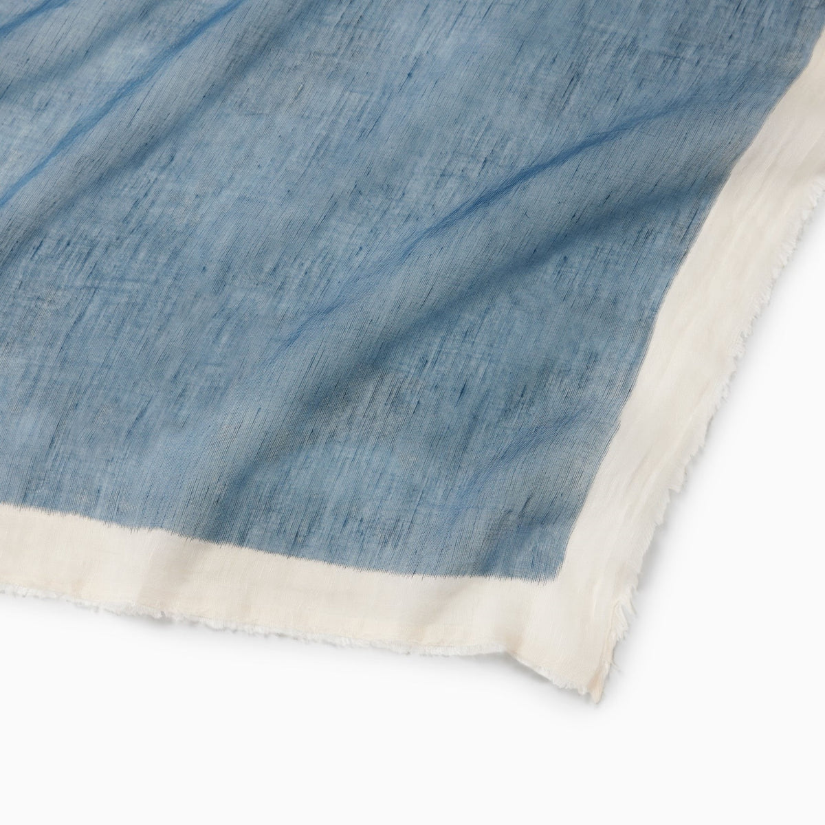 Detail Shot of Sferra Pitura Throw Blanket in Color Navy/Aqua