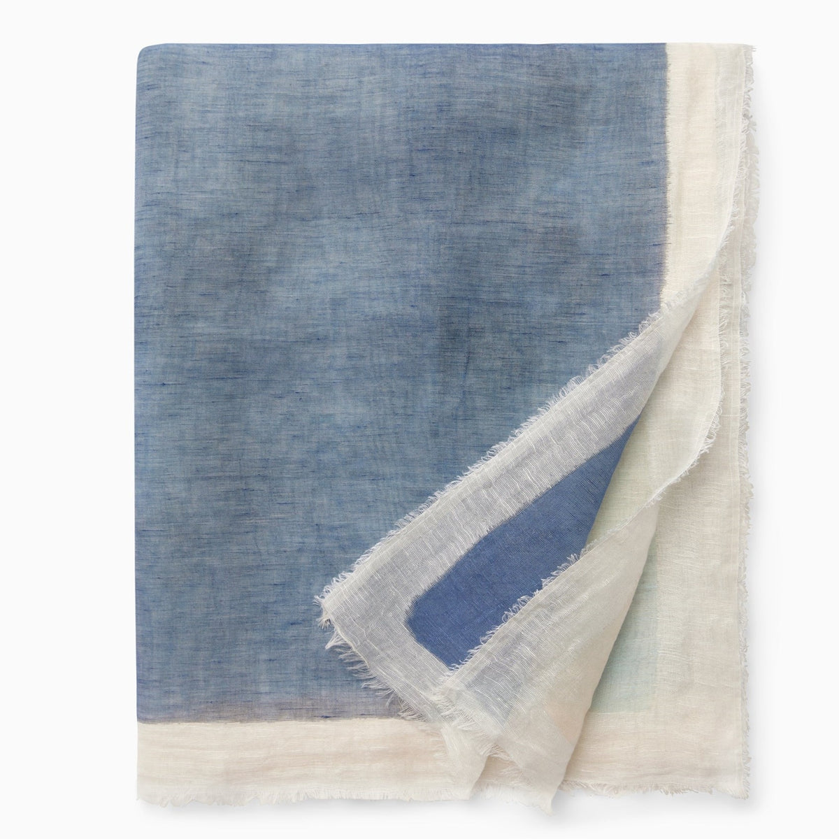 Folded Silo of Sferra Pitura Throw Blanket in Color Navy/Aqua