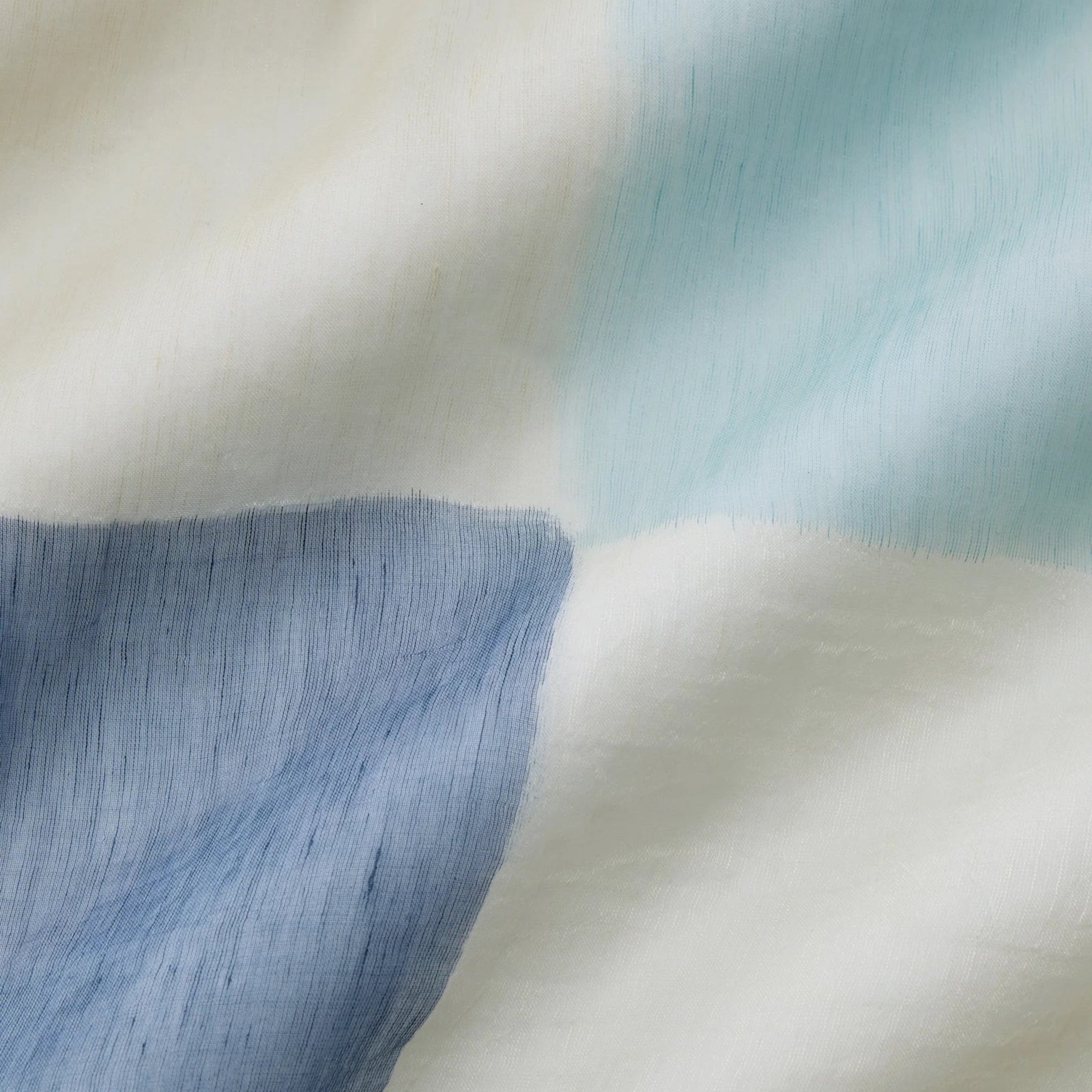 Folded Silo of Sferra Pitura Throw Blanket in Color Navy/Aqua