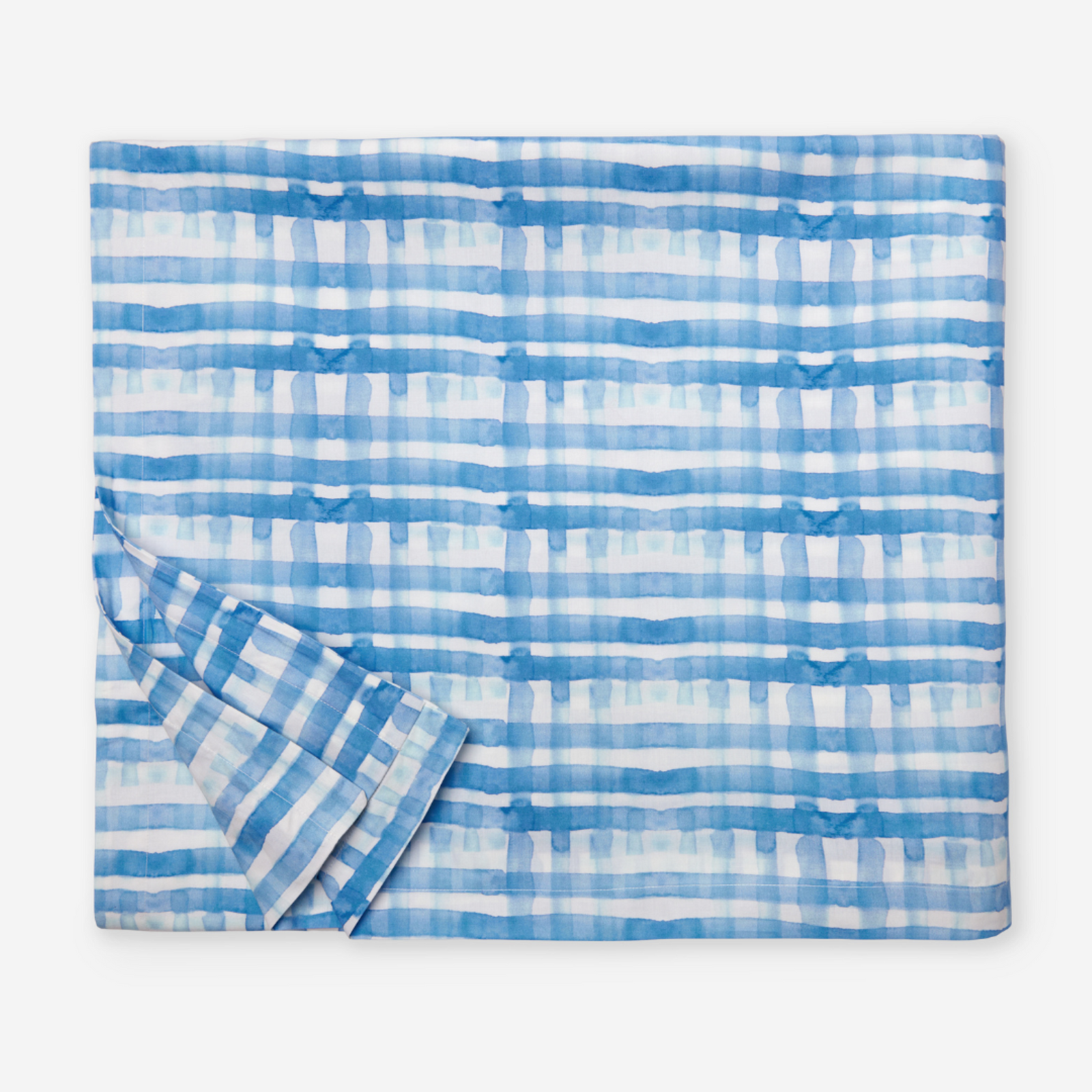 Full Lifestyle Image of Sferra Plaidino Bedding with Swatch of Clearwater