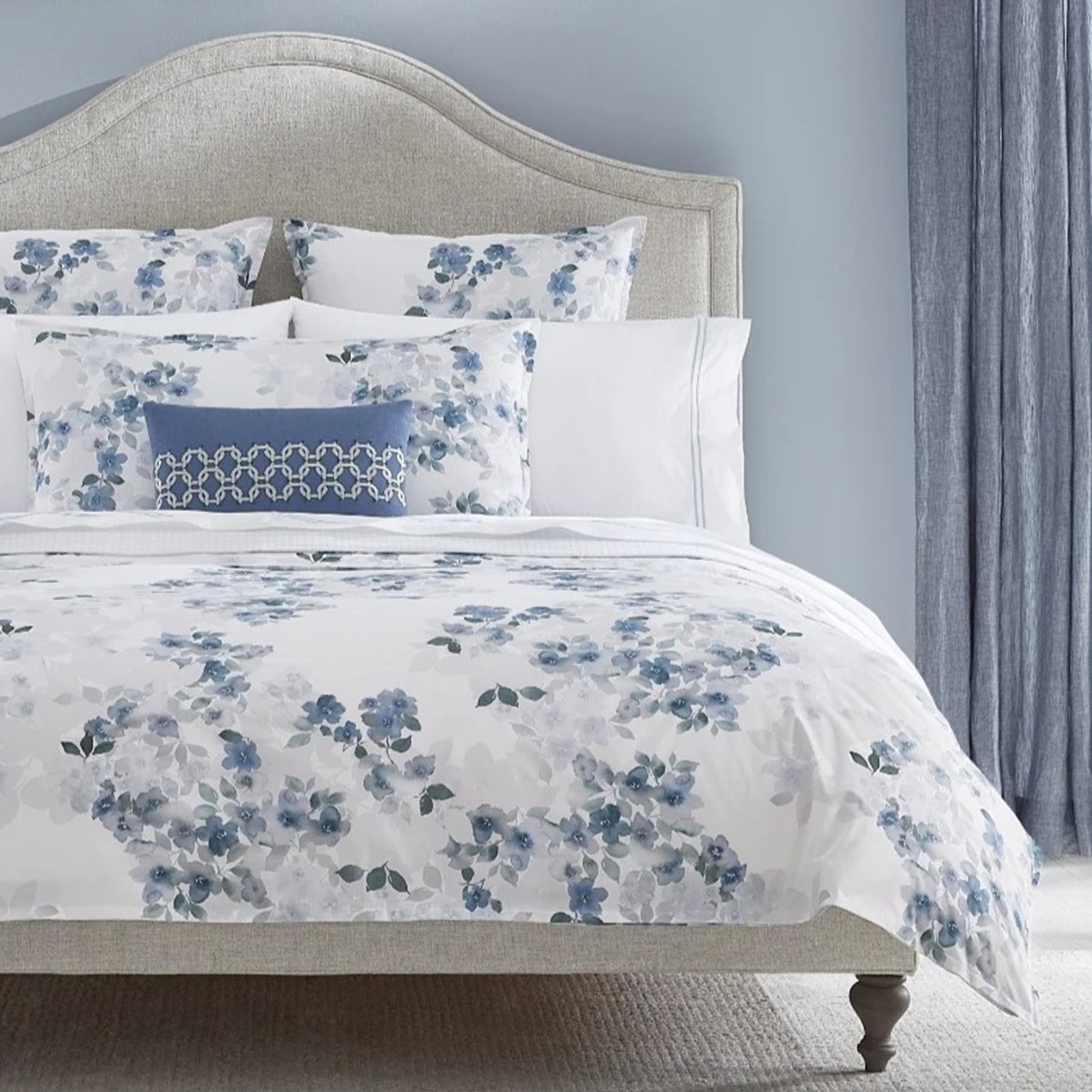 Bed Dressed in Sferra Primavera Bedding in Sea Color