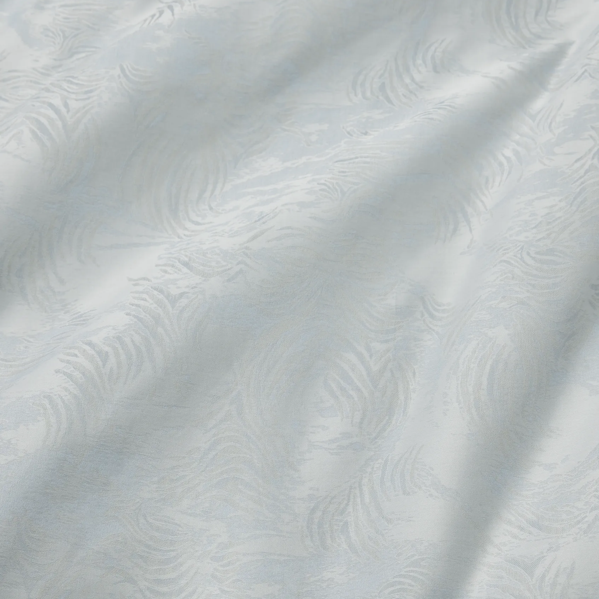 Fabric Close-up of Sferra Riflesso Duvet Cover and Shams in Lunar